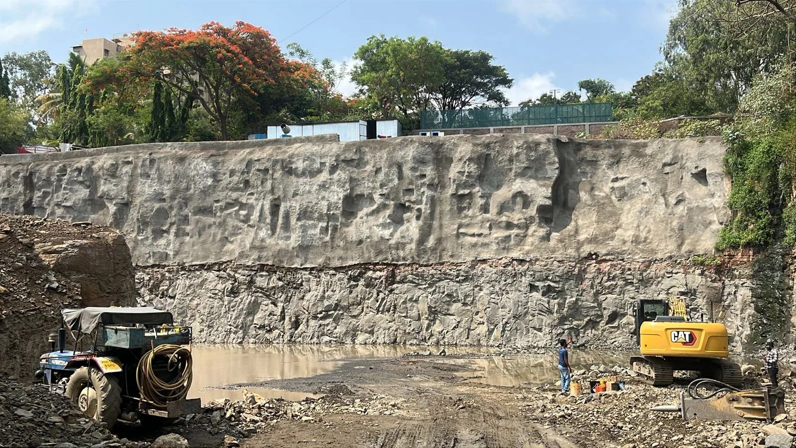 Surface Finishing at Rock Face - Quality Guniting by Bhoomi Constructions